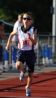 Preparing for an earned trip to the Natuional Junior Olympics in Sacramento, CA, Country Mills Eagles star, Mitch Flanger sets a Midget Boy's 100m Dash record with a time of 14.38. He also set a meet record in the Midget Boy's 800m run with a time of 2:35.48.